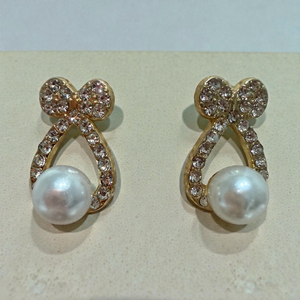 Elegant Gold and Pearl Bow Earrings